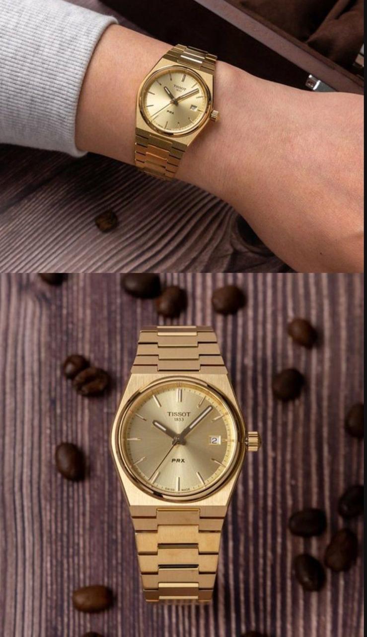 Tissot PRX Gold Watch.