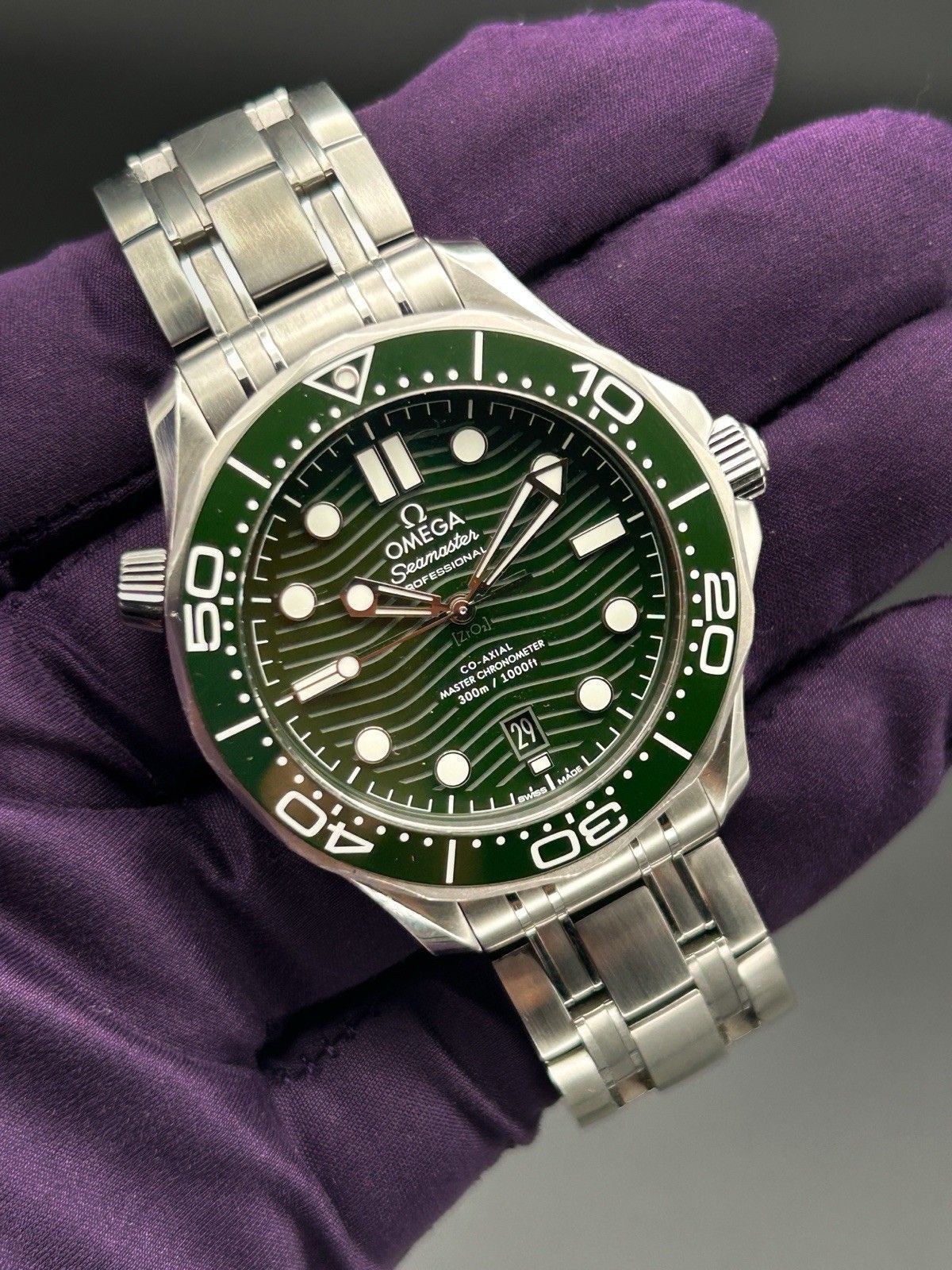 Omega Seamaster Green dial watch.