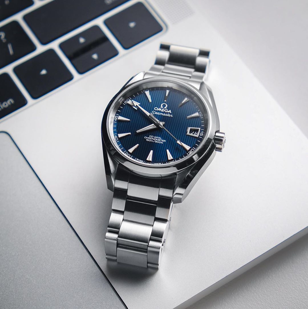 Omega Seamaster Aqua Terra 150M Co-Axial Master Chronometer 38 mm watch blue dial.