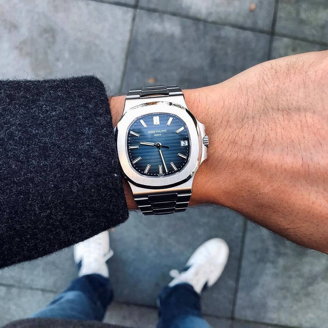 Patek Philippe Nautilus blue dial watch.