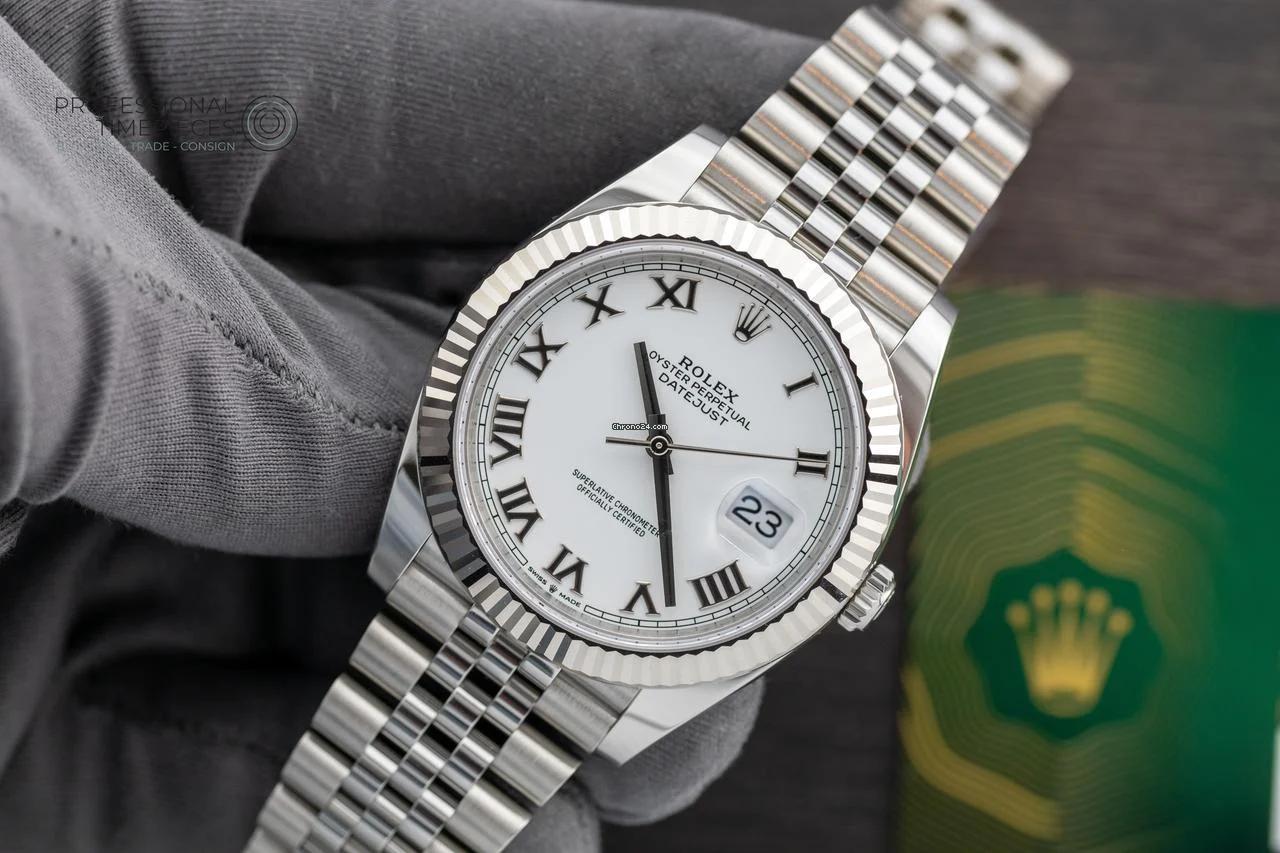 Rolex Datejust Oystersteel and white Roman dial and a Jubilee bracelet watch.