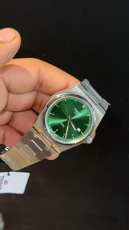 Tissot PRX steel chain with green dial.