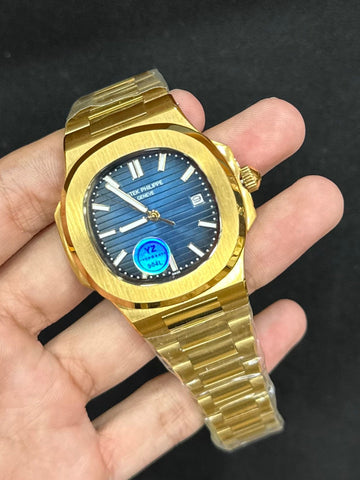 Patek Philippe Nautilus Gold Chain Blue Dial.