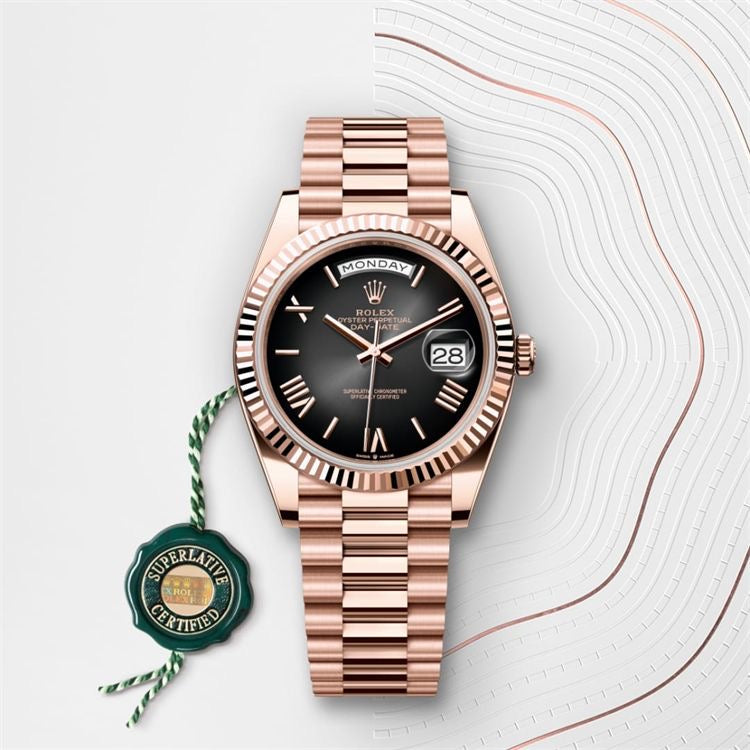 Rolex Day-Date 40 in 18 ct Everose gold with a slate ombré dial.