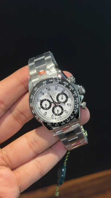 Rolex Oyster Perpetual Daytona White Dial.