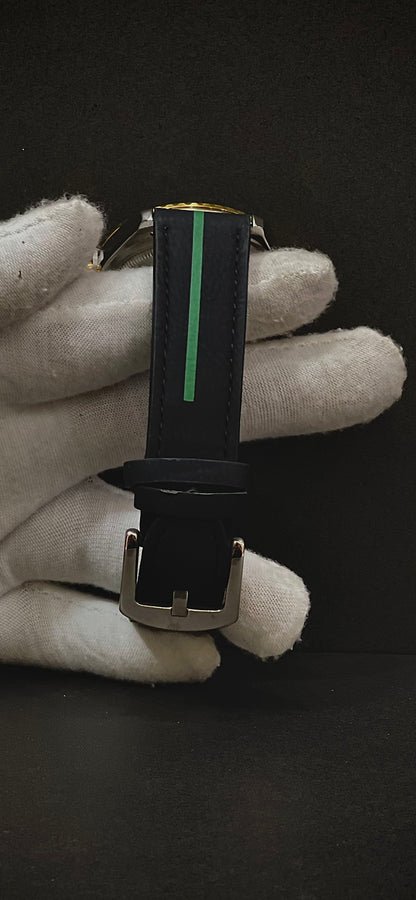 Rolex Oyster Perpetual Green and Golden Dial