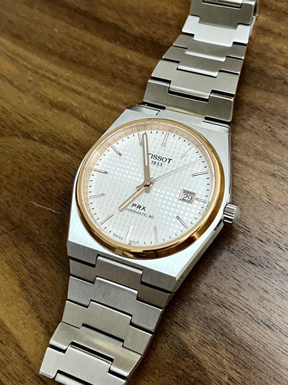 Tissot PRX silver dial and rose gold PVD bezel Watch.
