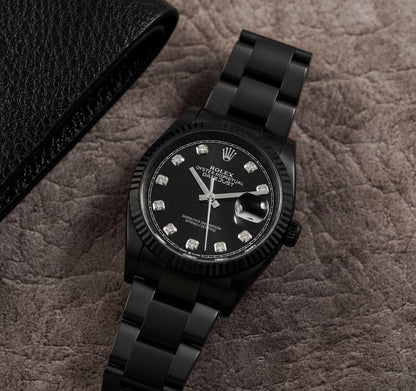 Rolex Datejust watch in an all-black PVD finish.