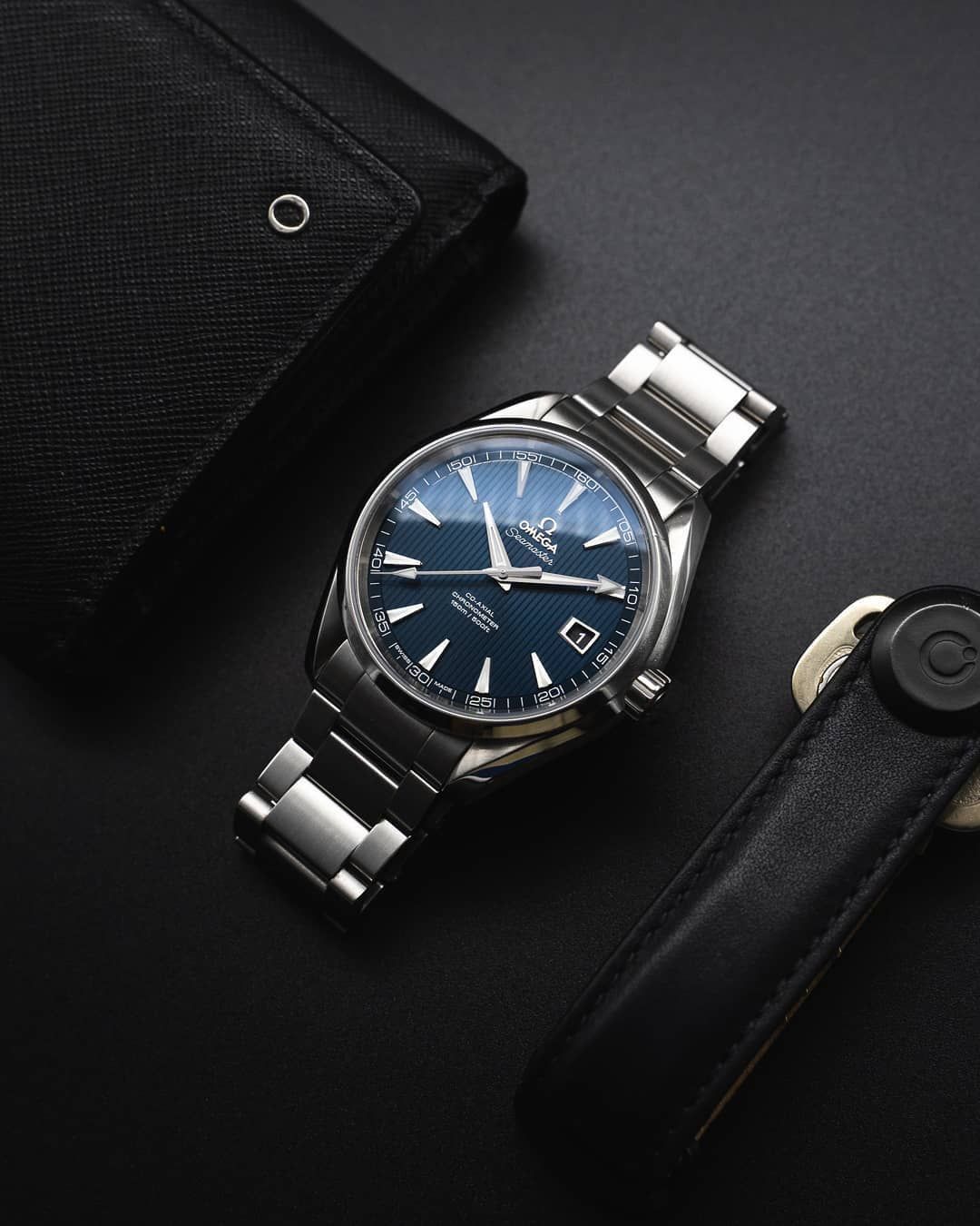 Omega Seamaster Aqua Terra 150M Co-Axial Master Chronometer 38 mm watch blue dial.