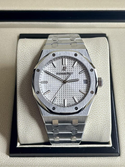 Audemars Piguet Royal Oak white dial watch.