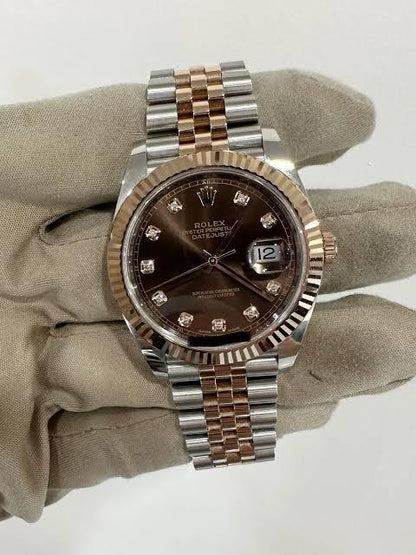 Rolex Datejust chocolate dial watch.