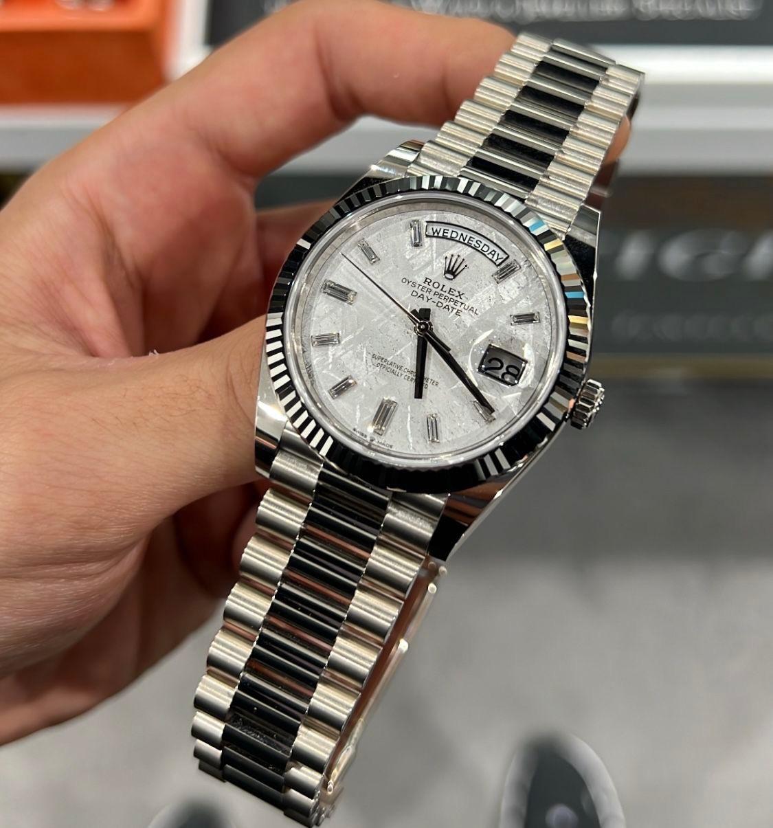 Rolex Day-Date in platinum diamond-set bezel, a meteorite dial watch.