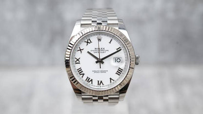 Rolex Datejust Oystersteel and white Roman dial and a Jubilee bracelet watch.