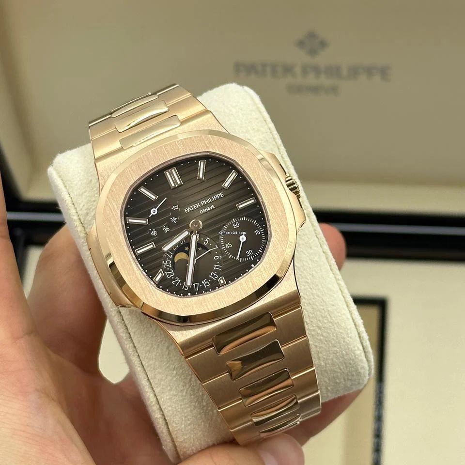 Patek Philippe Nautilus rose gold with a brown sunburst dial watch.