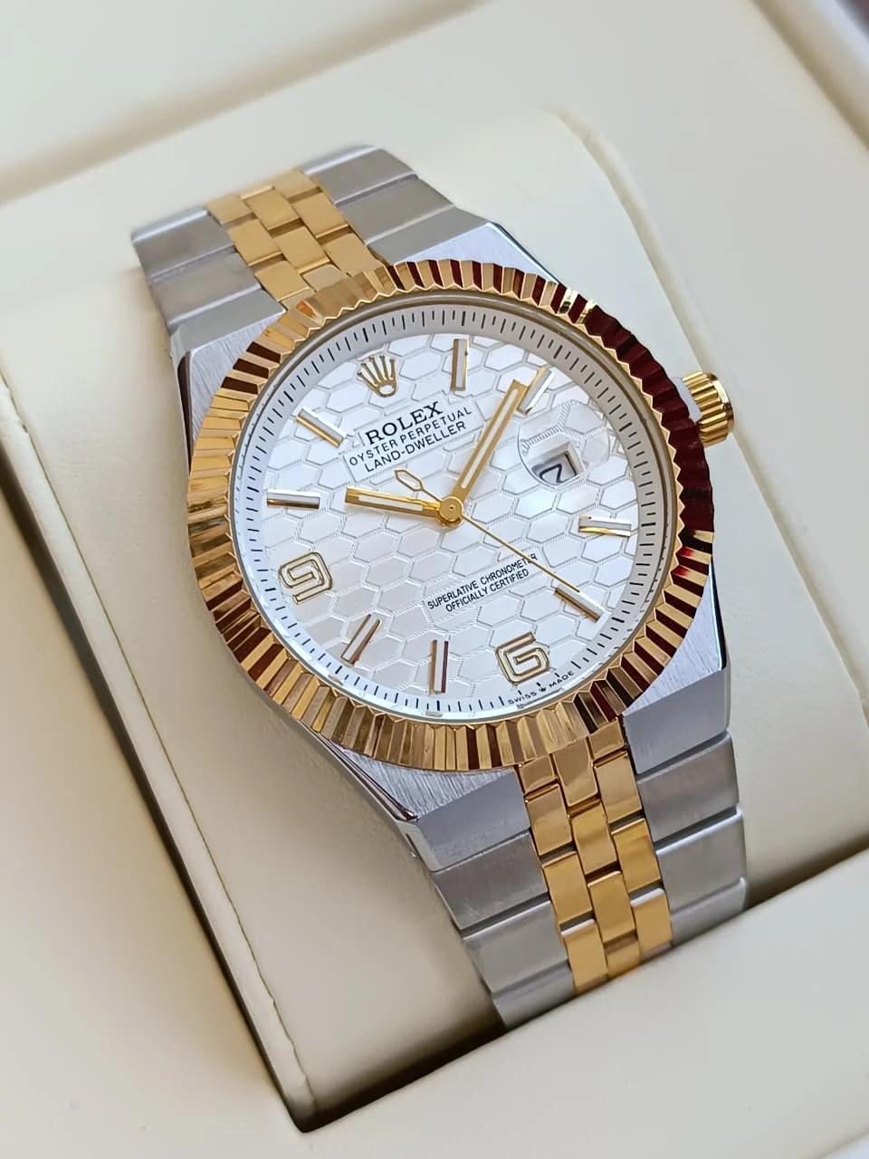 Rolex Oyster Perpetual Land-Dweller watch with silver and gold two-tone finishfluted bezel.