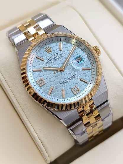 Rolex Oyster Perpetual Land-Dweller watch with a light blue dial.