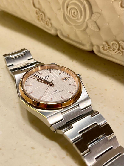 Tissot PRX silver dial and rose gold PVD bezel Watch.