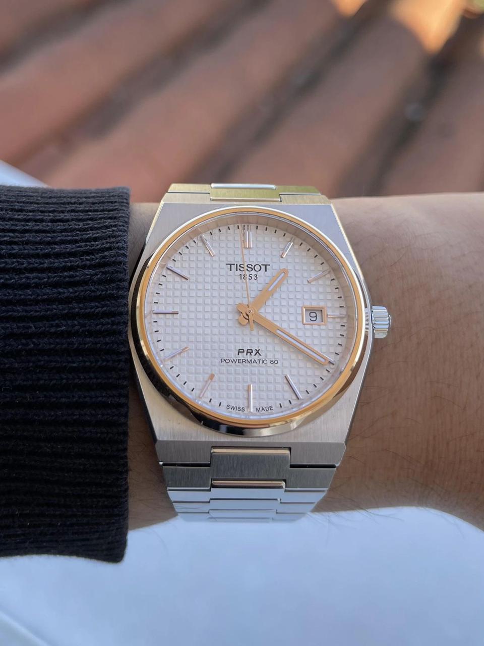 Tissot PRX silver dial and rose gold PVD bezel Watch.