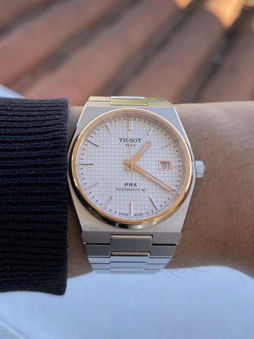 Tissot PRX silver dial and rose gold PVD bezel Watch.