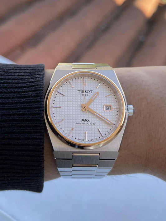 Tissot PRX silver dial and rose gold PVD bezel Watch.