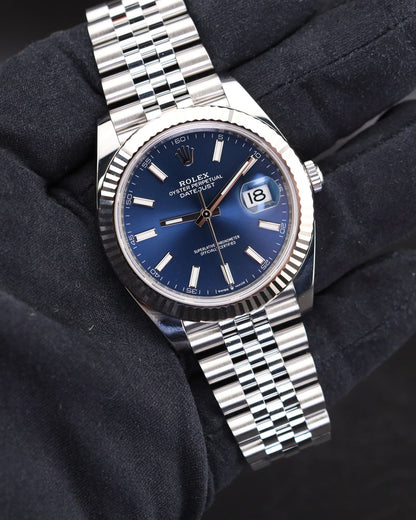 Rolex Oyster Perpetual Datejust blue dial watch.