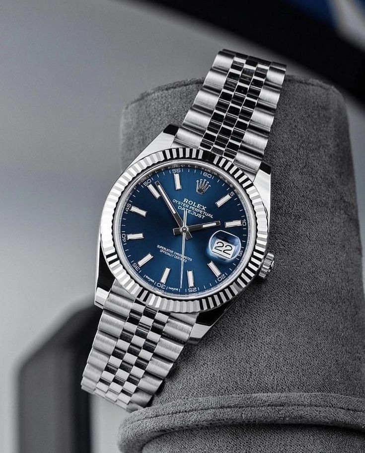 Rolex Oyster Perpetual Datejust blue dial watch.