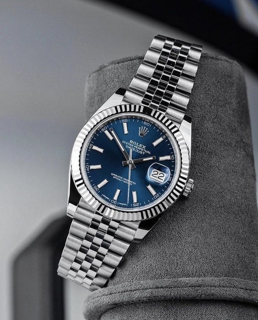 Rolex Oyster Perpetual Datejust blue dial watch.