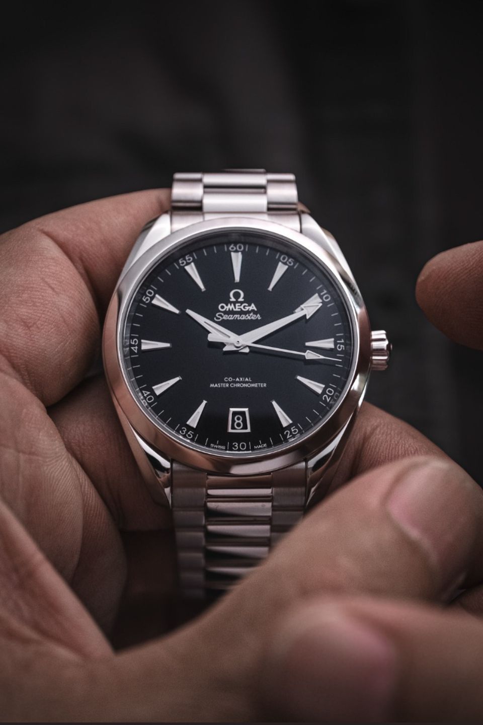 Omega Seamaster Aqua Terra 150M Co-Axial Master Chronometer 38 mm watch black dial.