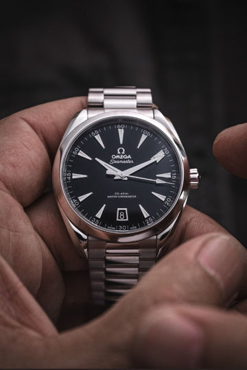 Omega Seamaster Aqua Terra 150M Co-Axial Master Chronometer 38 mm watch black dial.
