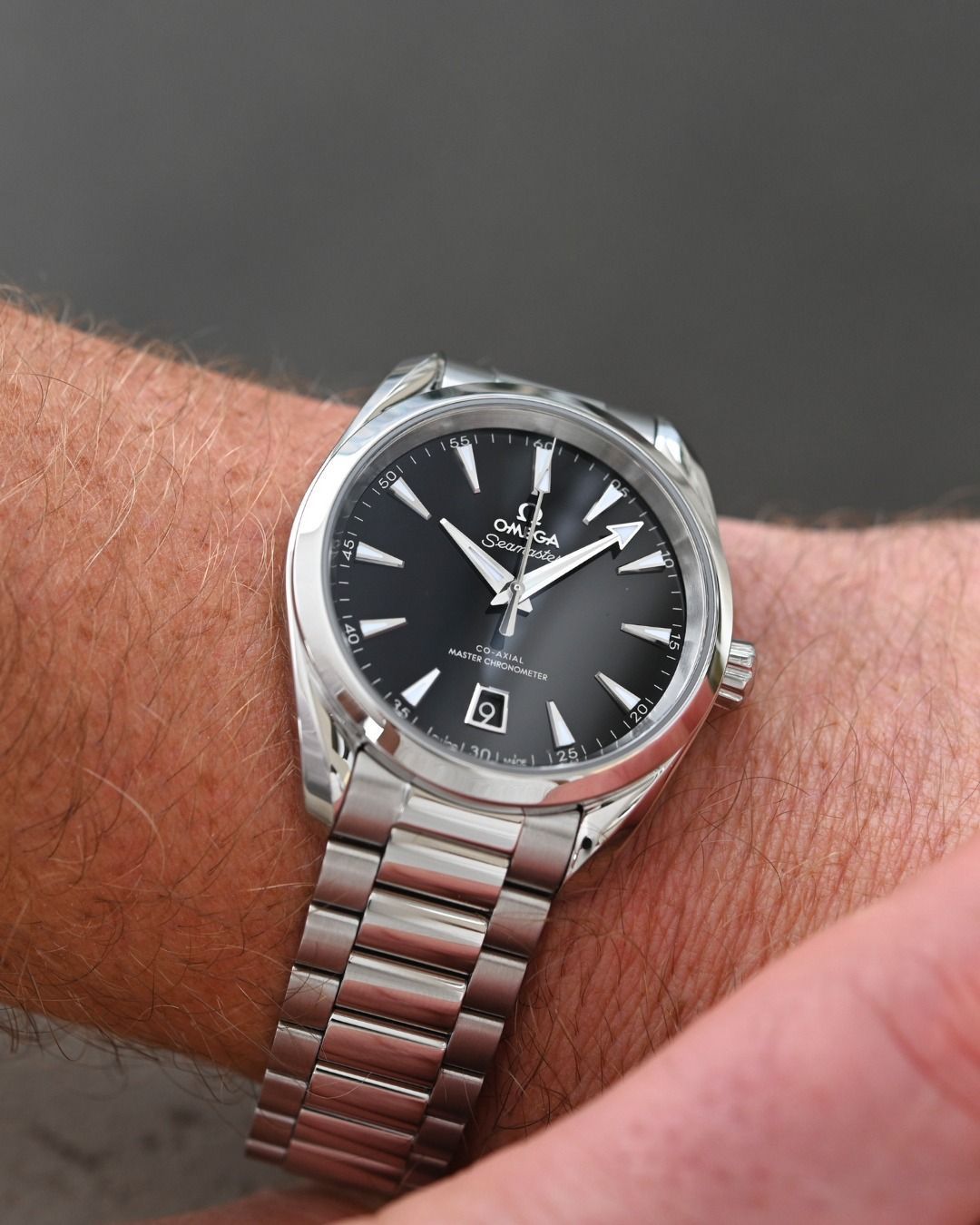 Omega Seamaster Aqua Terra 150M Co-Axial Master Chronometer 38 mm watch black dial.