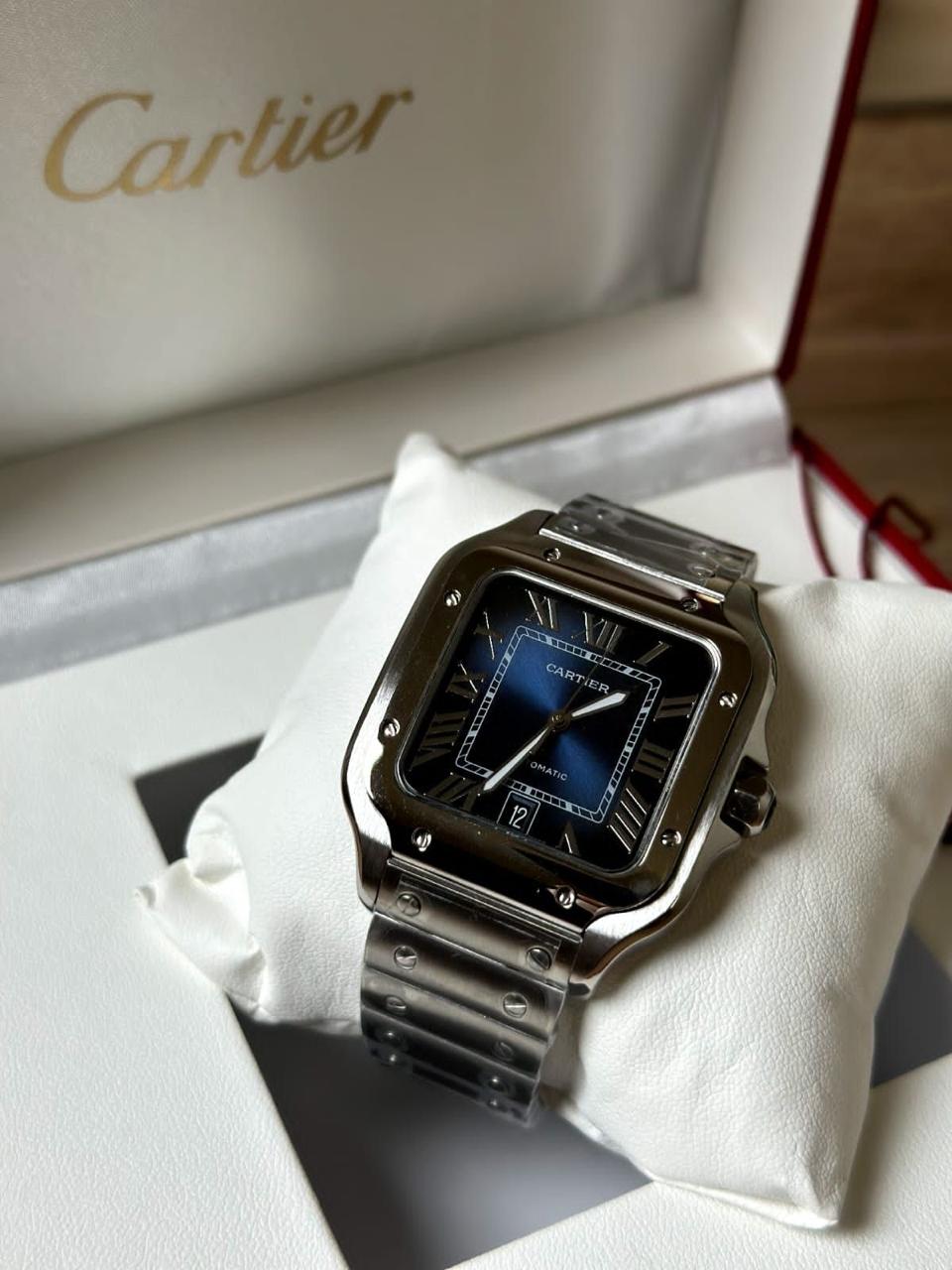 Santos de Cartier watch blue dial watch.