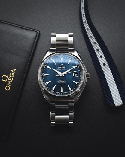 Omega Seamaster Aqua Terra 150M Co-Axial Master Chronometer 38 mm watch blue dial.