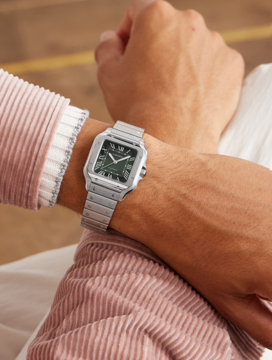 Santos de Cartier watch green dial watch.