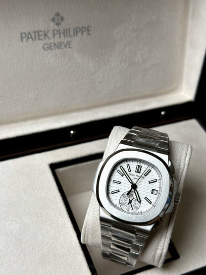 Patek Philippe Nautilus Chronograph white dial watch.