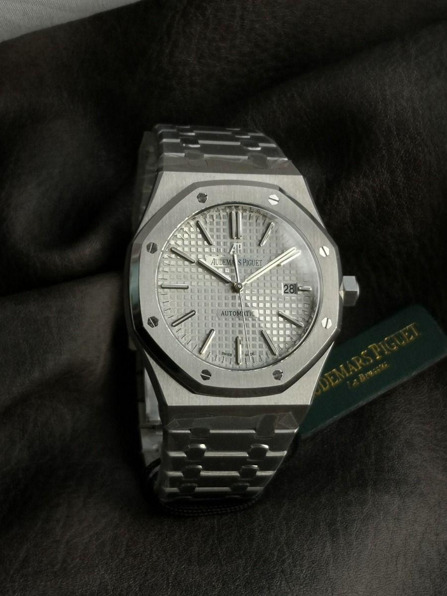 Audemars Piguet Royal Oak white dial watch.