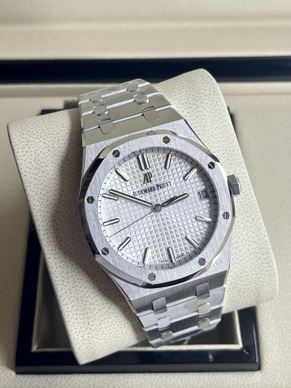 Audemars Piguet Royal Oak white dial watch.