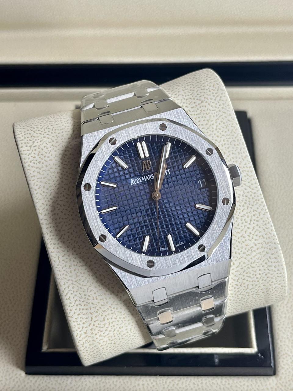 Audemars Piguet Royal Oak blue dial watch.