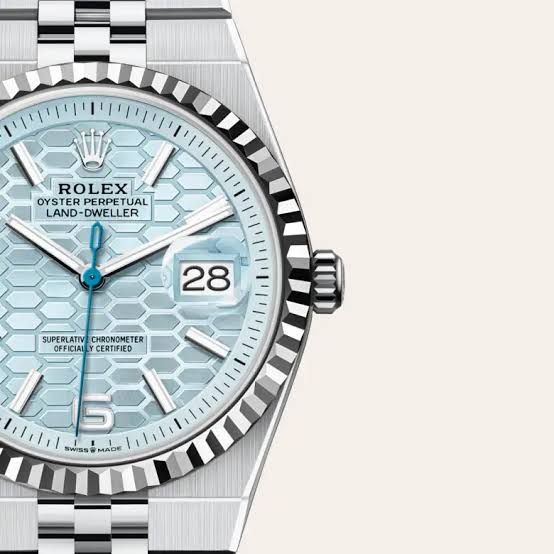 Rolex Oyster Perpetual platinum with an ice blue honeycomb dial.