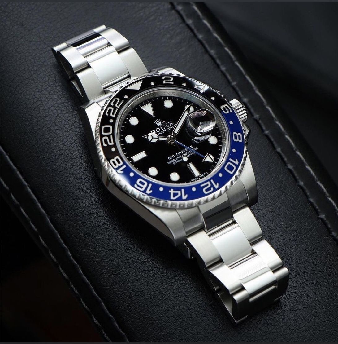 Rolex GMT-Master II "Batman" Oystersteel black dial watch.