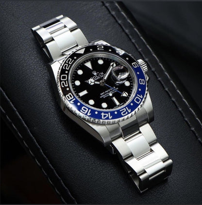 Rolex GMT-Master II "Batman" Oystersteel black dial watch.