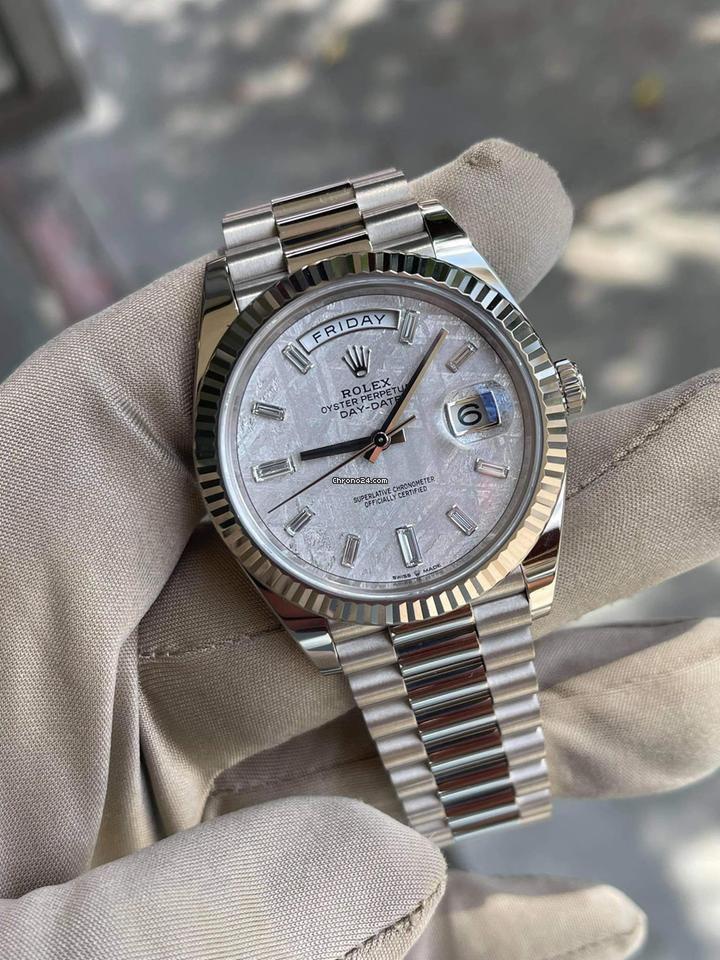 Rolex Day-Date in platinum diamond-set bezel, a meteorite dial watch.