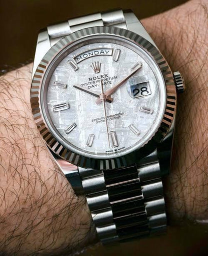 Rolex Day-Date in platinum diamond-set bezel, a meteorite dial watch.