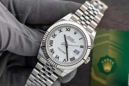 Rolex Datejust Oystersteel and white Roman dial and a Jubilee bracelet watch.
