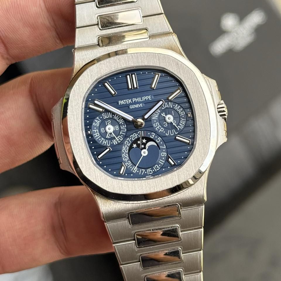 Patek Philippe Nautilus  rose gold perpetual calendar in white gold.
