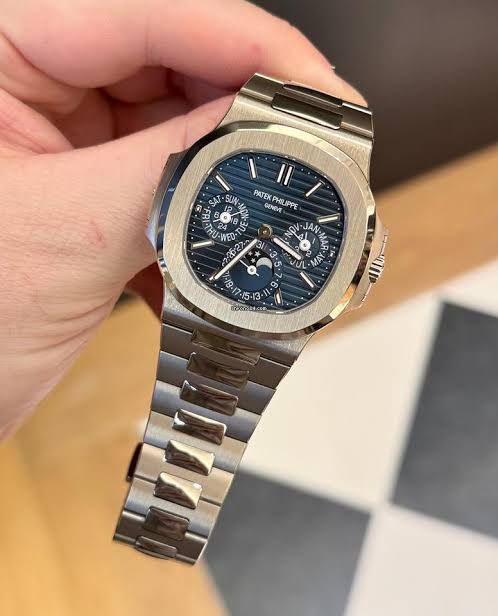 Patek Philippe Nautilus  rose gold perpetual calendar in white gold.