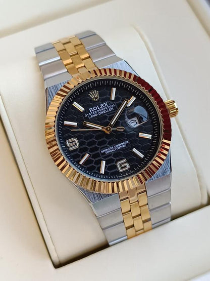 Rolex Oyster Perpetual Land-Dweller watch with a light black dial.