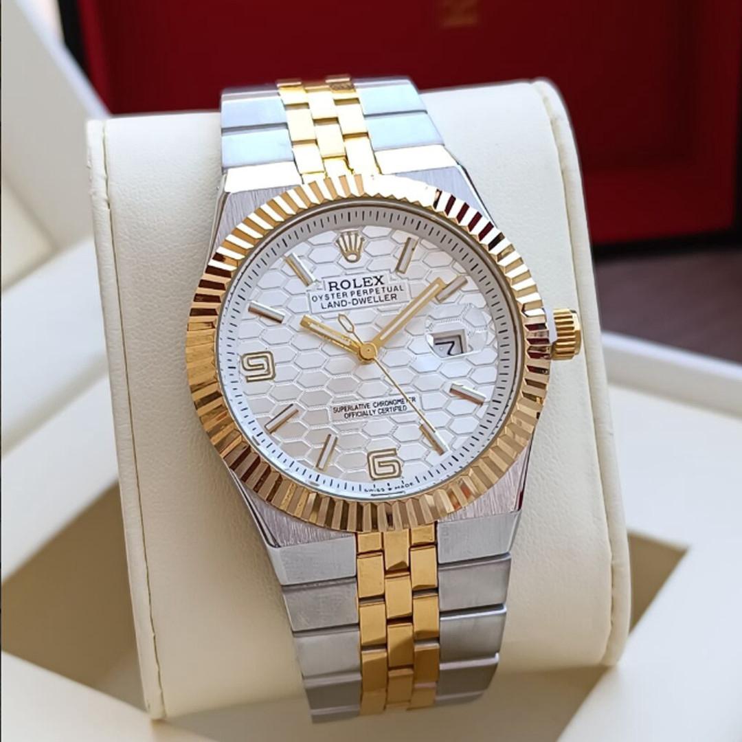 Rolex Oyster Perpetual Land-Dweller watch with silver and gold two-tone finishfluted bezel.