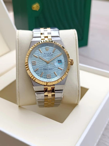 Rolex Oyster Perpetual Land-Dweller watch with a light blue dial.