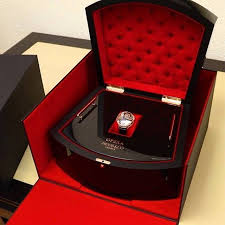 Jacob &amp; Co Godfather in its iconic red luxury box.